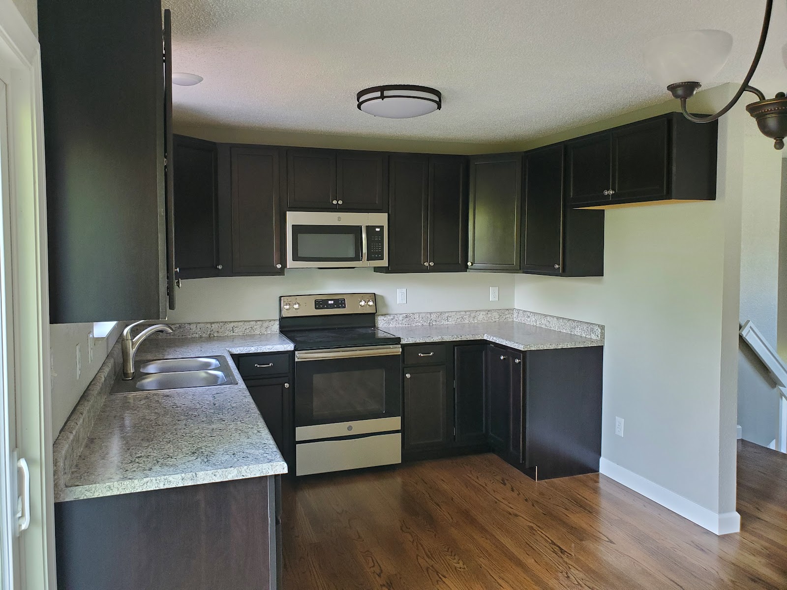 Modern kitchen with dark cabinets